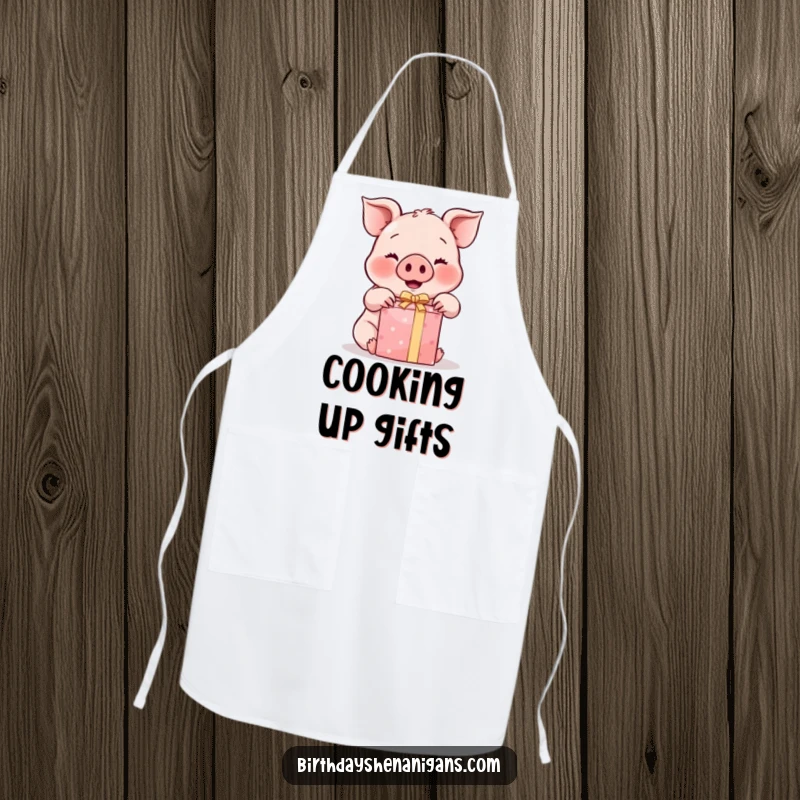 Funny Kawaii Pig Apron: A rosy-cheeked pig enthusiastically unwraps a gift, making kitchen tasks fun and festive.