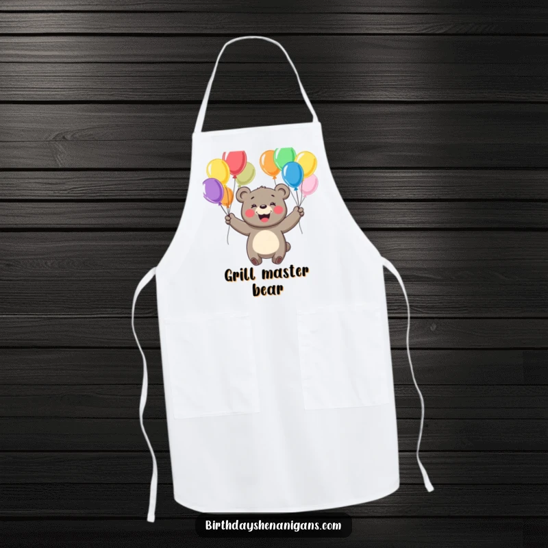 Funny apron featuring a cheerful bear with a big smile, juggling colorful balloons, ready for kitchen fun.