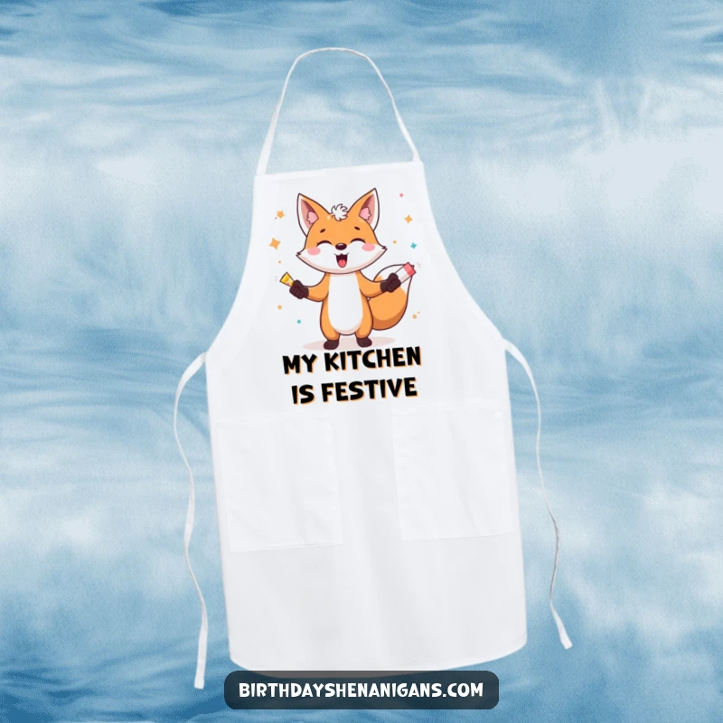 Funny apron with a gleeful fox character energetically juggling party poppers, ready to add flair to any cooking session.