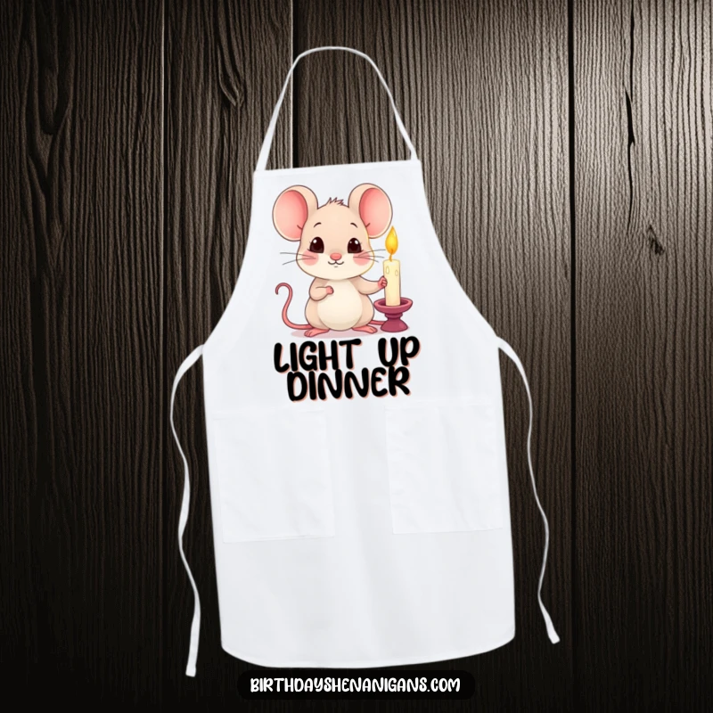 Funny kawaii mouse holding a single lit candle with a curious expression on a kitchen apron.