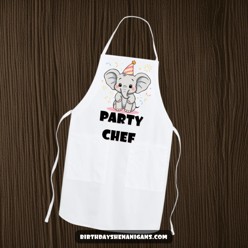 Funny Elephant Apron: Delighted character in birthday hat sprays poppers, a cheerful kitchen accessory.