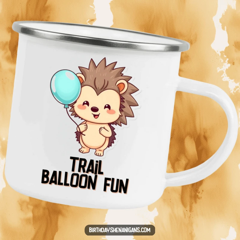 Funny hedgehog camping mug featuring a smiling character holding a colorful balloon, designed for cheerful outdoor moments.