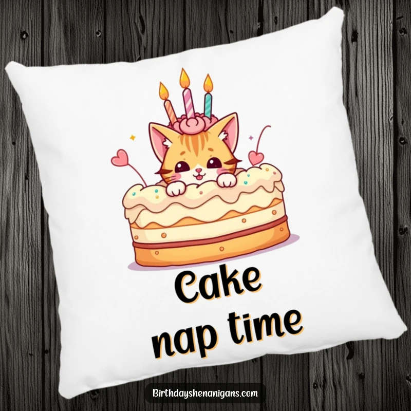 Funny pillow showcasing a playful cat character peeking out from a giant birthday cake, adding a touch of whimsy.