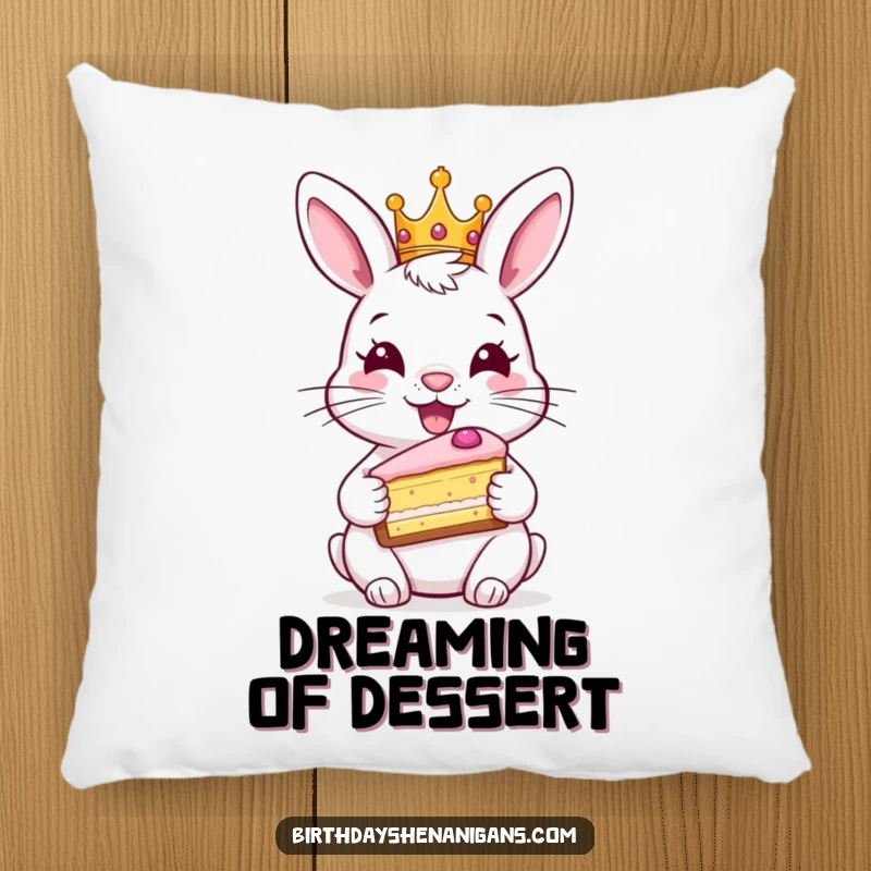 Funny rabbit pillow, comfy, wearing crown, holding cake, royal accent, cute bunny, soft and humorous.