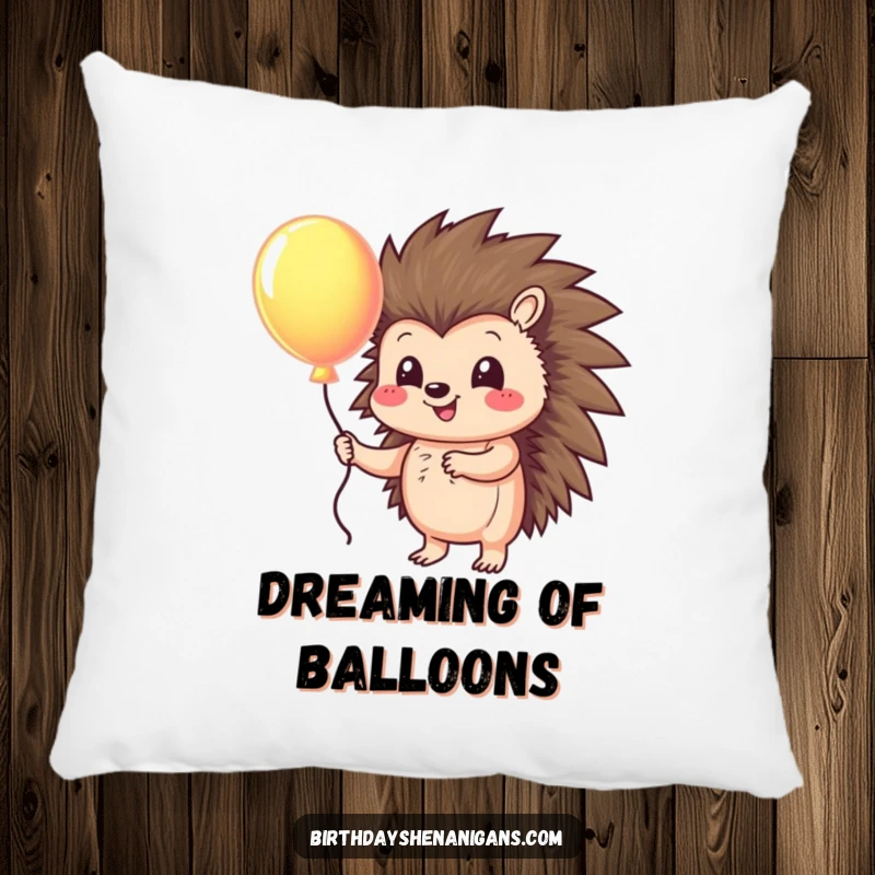 Funny pillow featuring a cheerful hedgehog character holding a vibrant balloon, a cozy and humorous addition to any sofa.