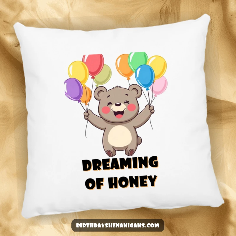 Funny pillow showcasing a cheerful bear with a big smile, juggling colorful balloons, perfect for adding comfort and cheer.