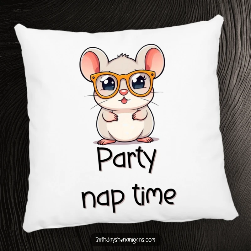 A round mouse character wearing party glasses, featured on a soft pillow for cozy, festive humor.