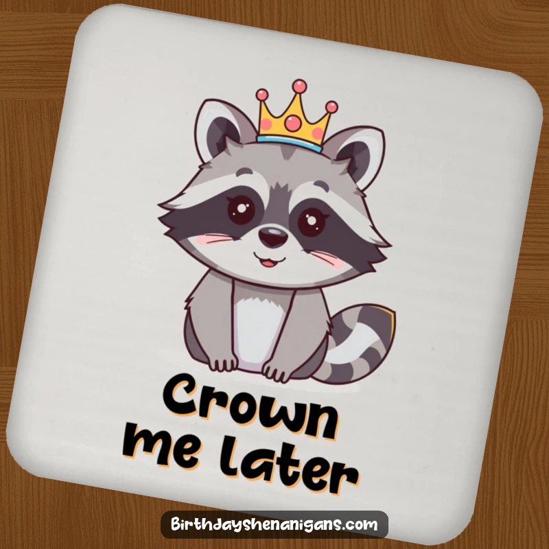 Funny raccoon coaster with a happy character wearing a festive crown, protecting furniture with royal flair.