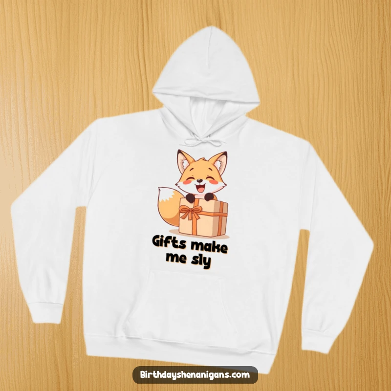 Funny hoodie depicting a smiling fox character enthusiastically unwrapping a comically large present, perfect for cozy unboxing moments.
