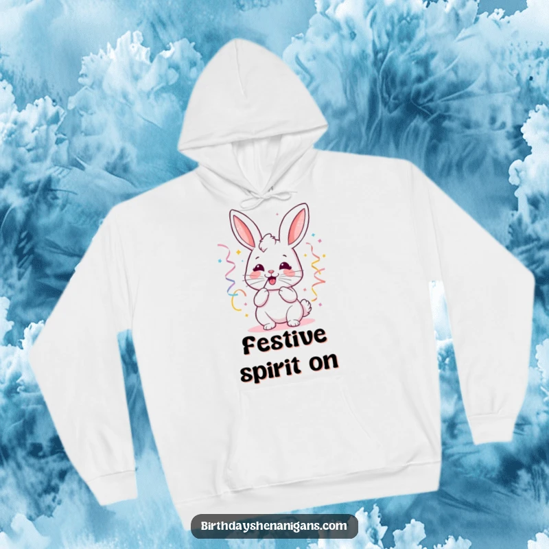 Funny kawaii bunny hoodie showing a joyful bunny blowing party streamers, perfect for warm and festive occasions.