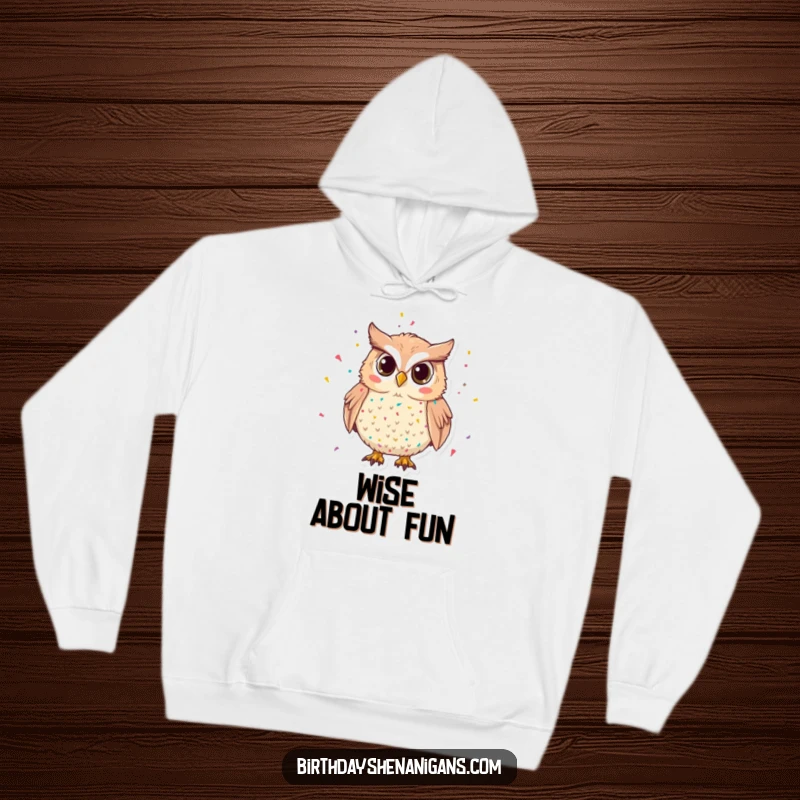 Funny Owl Hoodie: A mischievous owl with confetti offers warmth and party vibes, a perfect cozy funny gift.