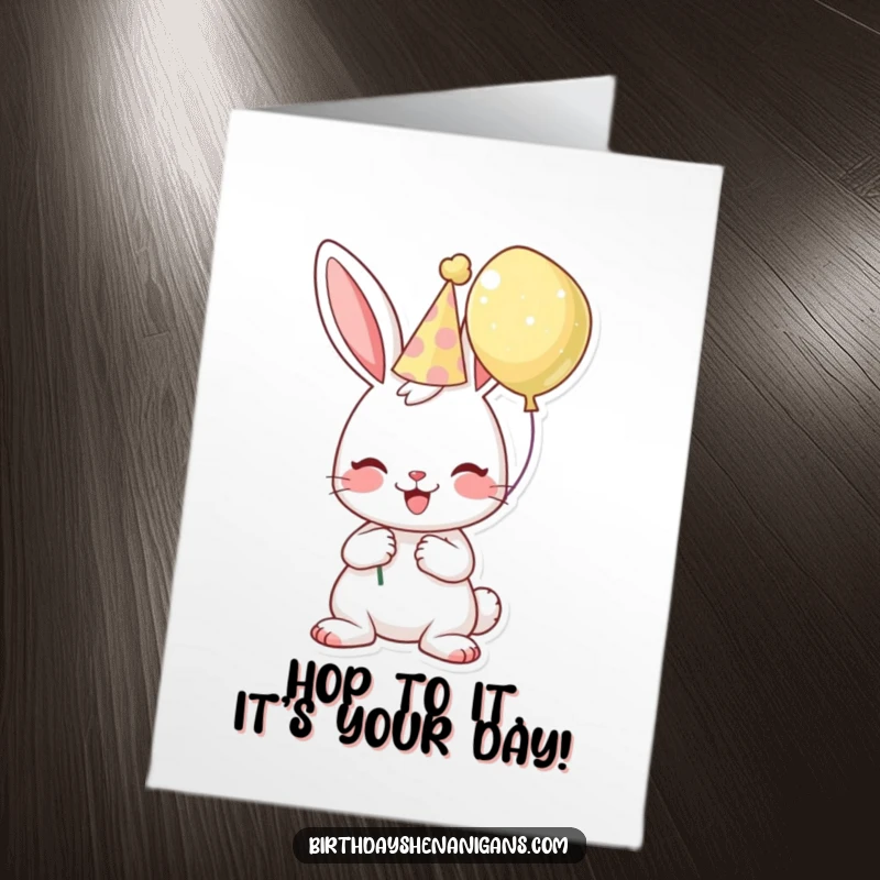 Funny Free Printable Birthday Card: A happy bunny in a party hat holds a balloon, ready for a hilarious celebration.