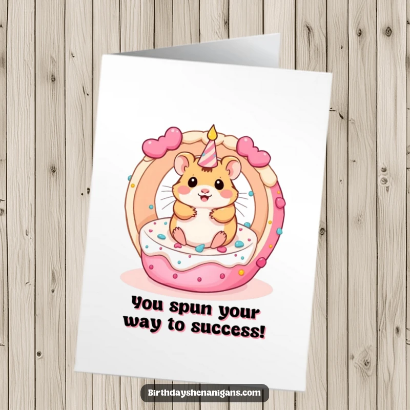 Funny Free Printable kawaii hamster spinning inside a cake, ideal for a congratulations card.