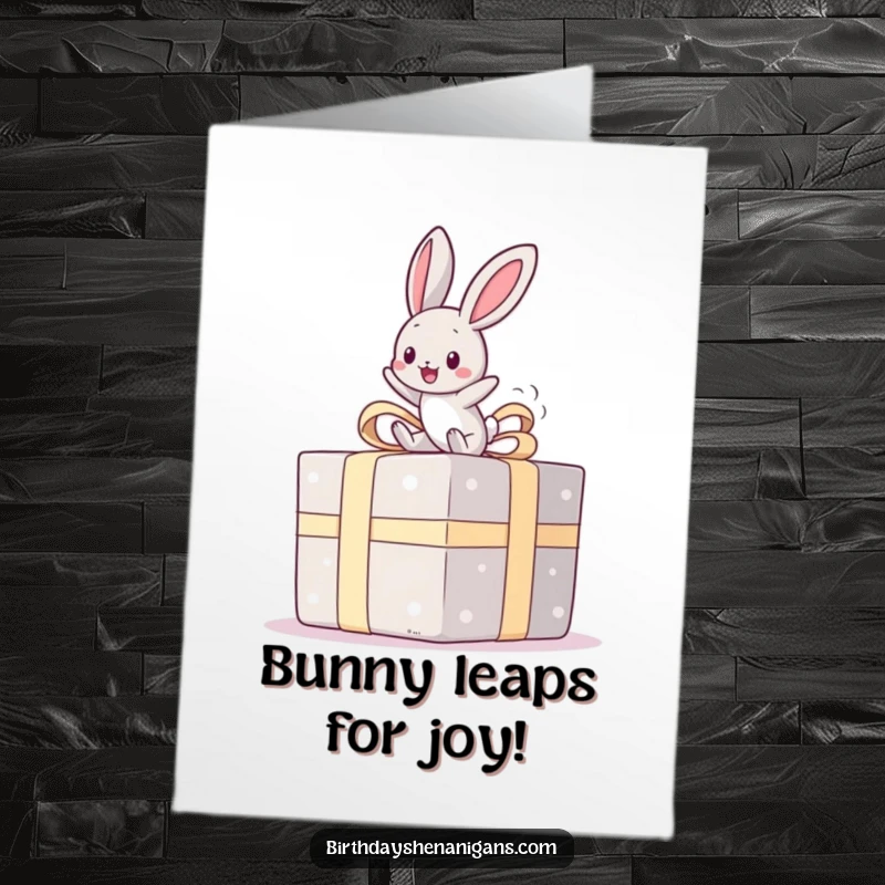 Funny Free Printable Kawaii Bunny Congratulations Card: A cute bunny happily bouncing on a comically oversized gift box.