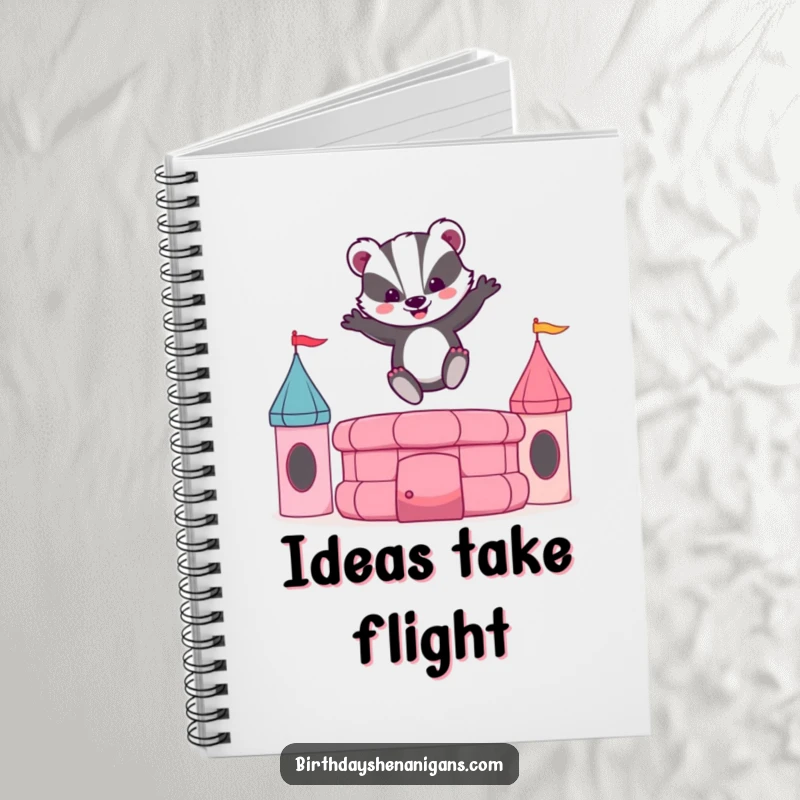 Funny notebook cover with a cheerful badger bouncing on a bouncy castle, inspiring energetic and fun notes.