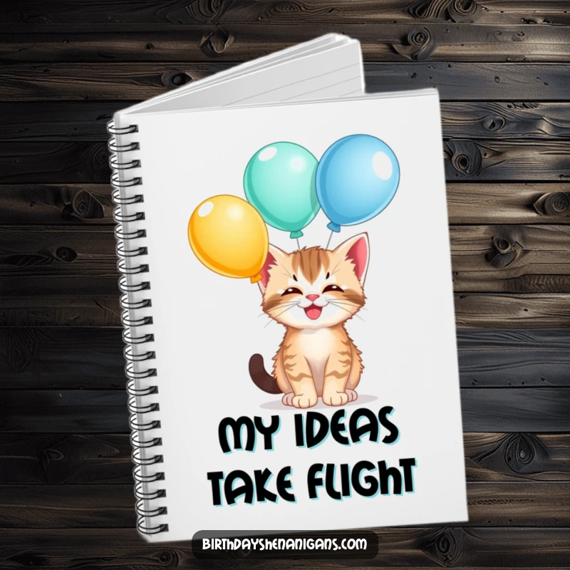 Funny kitten notebook, giggling, balancing balloons, playful spirit, writing ideas, cute cat, humorous.