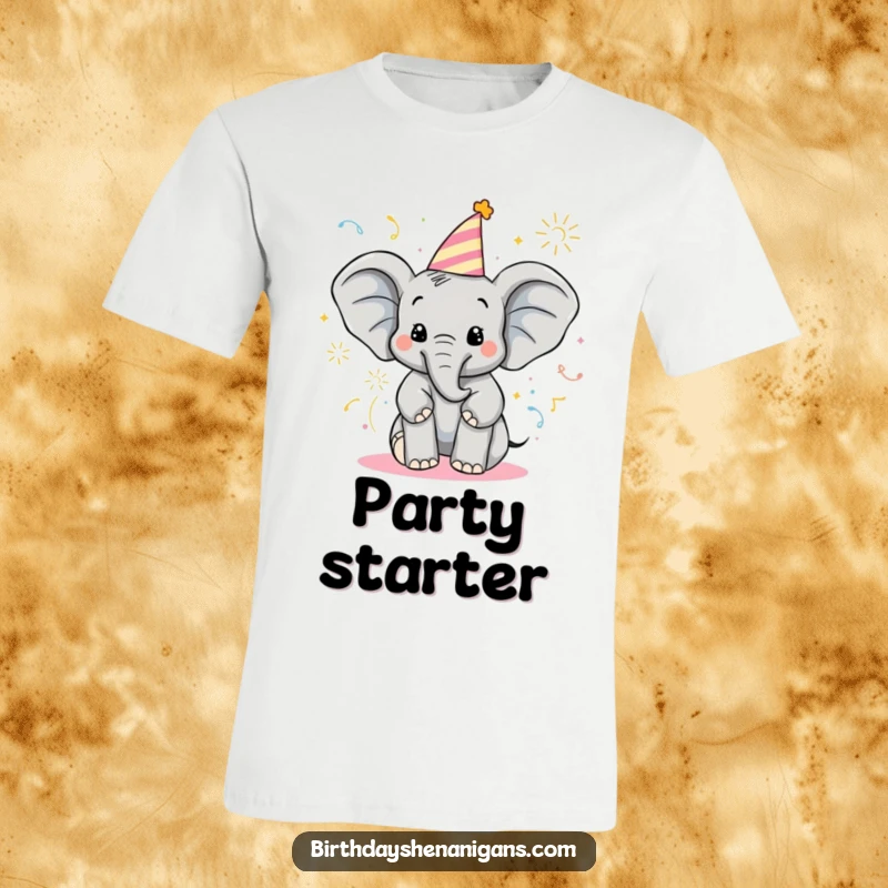 Funny Elephant T-Shirt: Delighted character with birthday hat sprays poppers, a joyful celebration of fun.