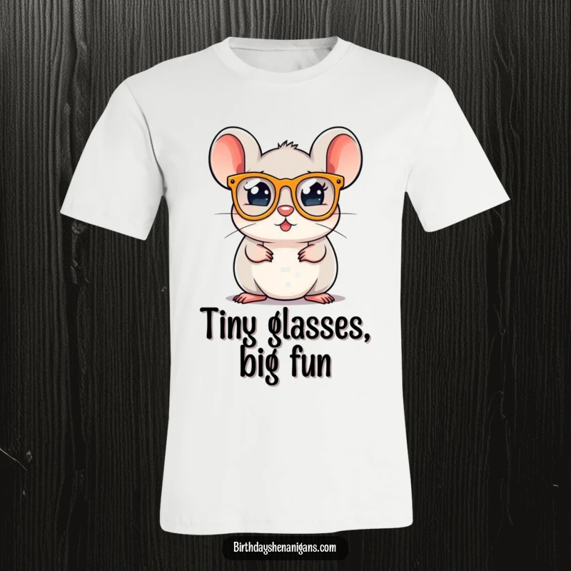 A cute, round mouse character sporting tiny party glasses, ready to dance the night away on a t-shirt.