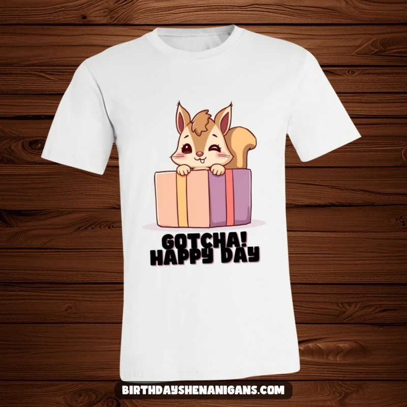 Funny giggling squirrel t-shirt with a playful character peeking from behind a giant present, ideal for humorous wear.