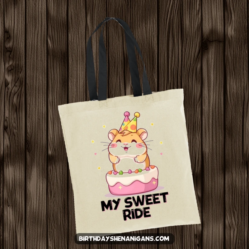 Funny Kawaii hamster in a party hat, spinning on a cake, captured on a practical and stylish tote bag.