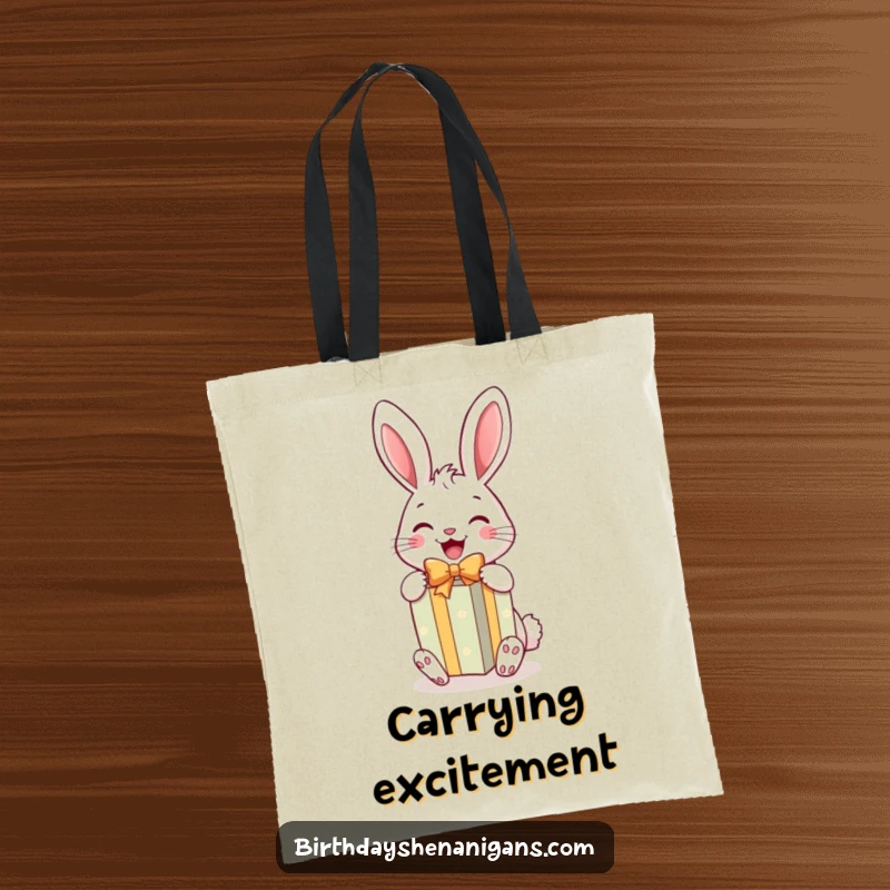 Funny Rabbit Gift Tote Bag: A cheerful rabbit joyfully unwraps a bright gift, perfect for carrying humorous treasures.