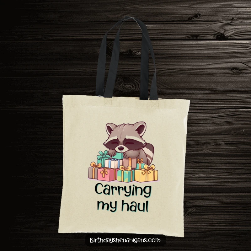 Funny Raccoon Tote Bag: A sleepy raccoon on gifts, perfect for carrying essentials during lazy days, a funny gift.