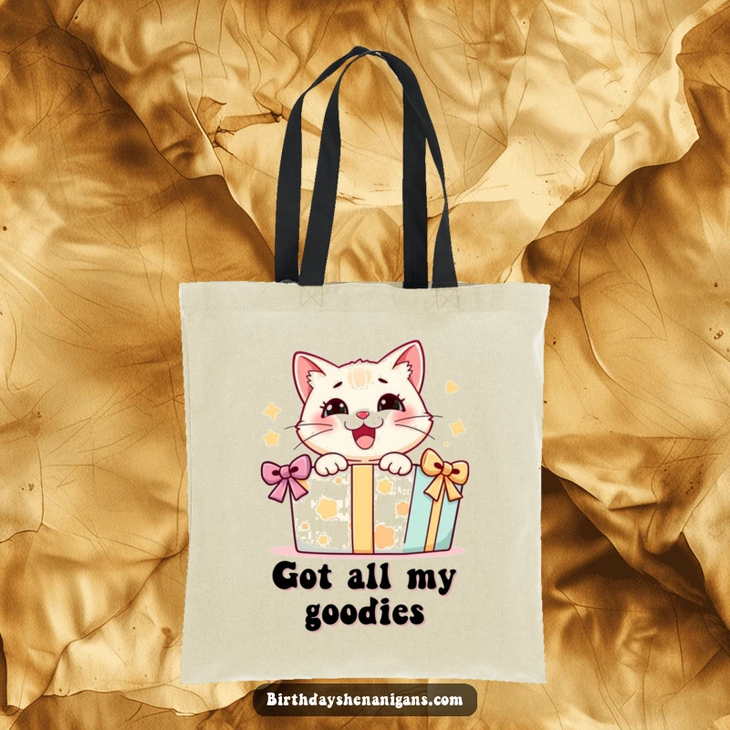 Funny tote bag illustrating a delighted cat character joyfully opening a large, intriguing gift box, perfect for carrying everyday essentials.