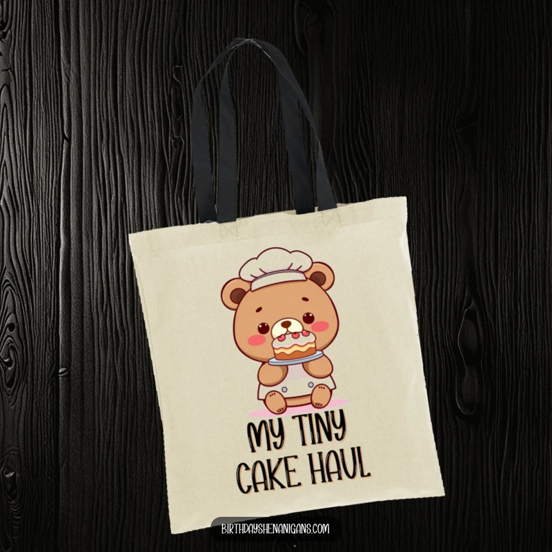 Funny tote bag featuring a kawaii bear chef with a comically tiny cake, adding a whimsical and humorous touch to everyday errands.