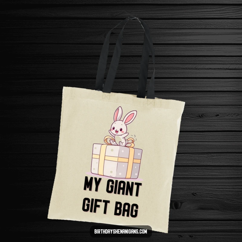 Funny tote bag featuring a bouncing kawaii bunny on a giant present, perfect for carrying essentials with a dose of playful joy.