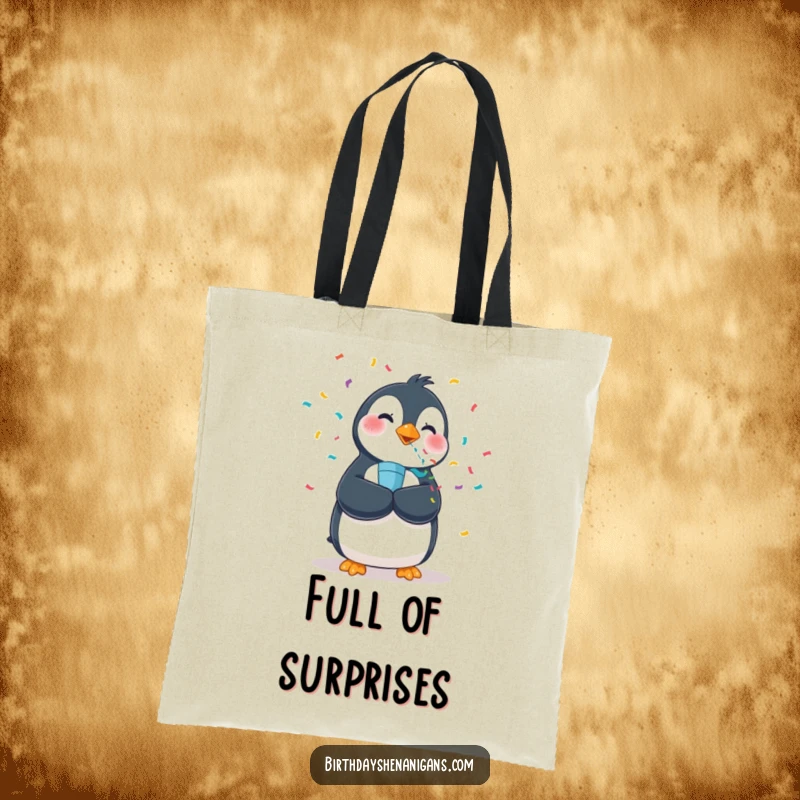 Funny tote bag depicting a wobbly penguin joyfully blowing a confetti popper, ready for any festive occasion.